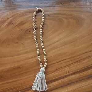 Elegant Tan Beaded Necklace with Tassel